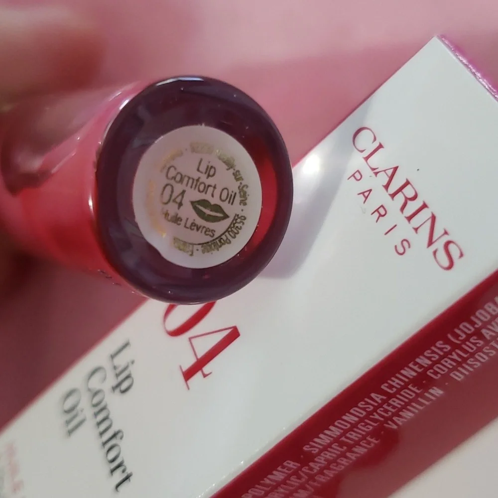 DELUXE CLARINS 04 LIP COMFORT OIL WITH SWEETBRIAR ROSE OIL.